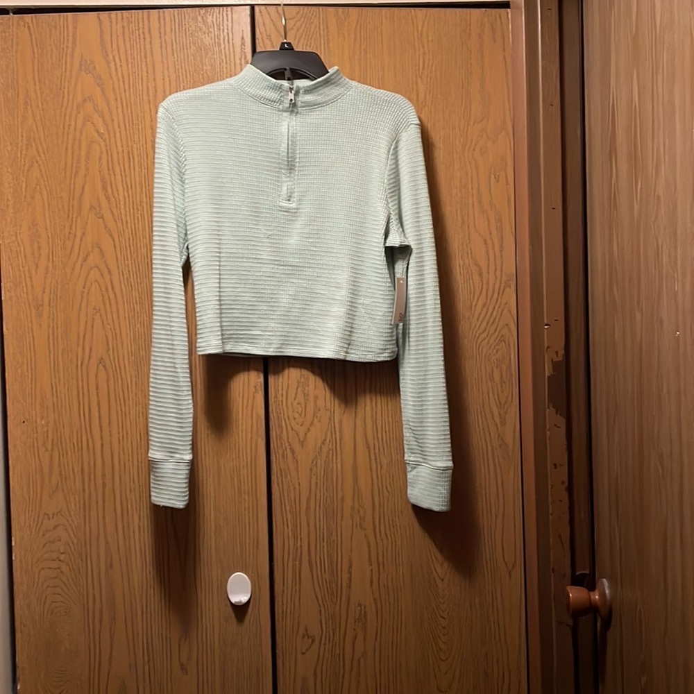 🔥Sale🔥..mint green top with a zipper from chest to neck..NWT